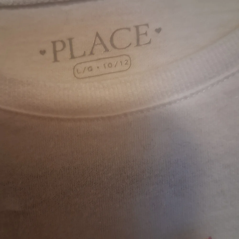 The Children's Place White Graphic Tee with Colorful Characters Size LG (10-12)